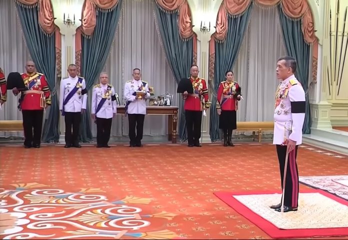 Gen. Suthida Vajiralongkorn Na Ayudhya, second from right, stands guard while King Vajiralongkorn takes up kingship Dec. 1. Image: Royal Household Bureau