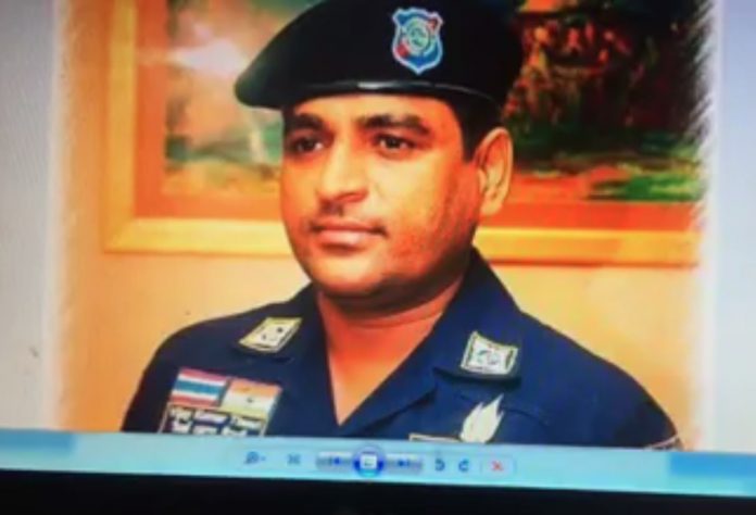 A video screencap of one of two men accused of extorting bribes from business owners in Phuket province. Image: Spotlight Phuket