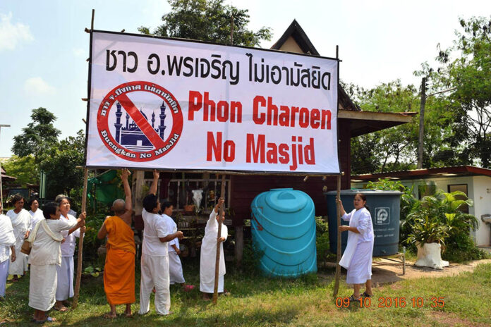 A banner opposing construction of mosques in Bueng Kan province's Phon Charoen district posted to a Thai Facebook page that is a clearinghouse of anti-Muslim sentiments. Photo: No Mosques in Bueng Kan / Facebook A banner opposing construction of mosques in Bueng Kan province's Phon Charoen district posted to a Thai Facebook page that is a clearinghouse of anti-Muslim sentiments. Photo: No Mosques in Bueng Kan / Facebook