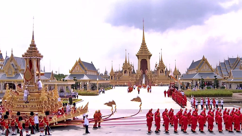 The Great Victory Chariot bearing the royal urn arrives Thursday at the temporary funerary complex in Bangkok's Sanam Luang.