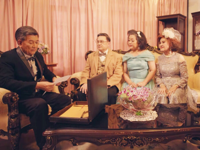 Still image from an Energy Ministry video about saving electricity based on the 'last will and testament' scenes from legendary lakorn classic 'Baan Sai Tong.' Image: Energy Ministry / YouTube