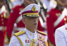 King Rama X Asks King Bhumibol’s Grace to Protect Thais in 2018 King Vajiralongkorn walks Thursday, Oct. 26, 2017, during a procession for his father. Photo: Wason Wanichakorn / Associated Press