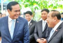 Cabinet Reshuffle Pinned on Junta Economic Fails Junta chief Prayuth Chan-ocha shares a laugh with his deputy Prawit Wongsuwan in an undated file photo.