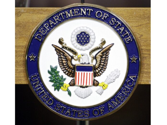 The United States Department of State seal on a podium at the State Department in 2011 in Washington. Photo: Alex Brandon / Associated Press