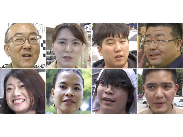From left to right: Yoh Kawakami and Yumu Katsuyama from Japan; Ock Hyun-woong from South Korea; Ding Chenling and Zhao Yingran from China; Bach Ngoc Lien from Vietnam; Jeanne Vivar and Lorenzo Nakpil from the Philippines; are interviewed by the Associated Press about President Donald Trump's upcoming visit to Asia. Photo: Associated Press