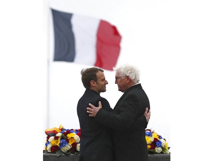 French President Emmanuel Macron, left, and German President Frank-Walter Steinmeier left, attend a commemoration ceremony at the World War I Vieil Armand