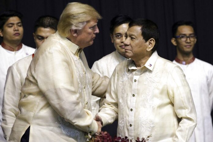 President Donald Trump shakes hand with Philippines President Rodrigo Duterte in 2017 during the gala dinner marking ASEAN's 50th anniversary in Manila, Philippines. Athit Perawongmetha / Associated Press President Donald Trump shakes hand with Philippines President Rodrigo Duterte in 2017 during the gala dinner marking ASEAN's 50th anniversary in Manila, Philippines. Athit Perawongmetha / Associated Press