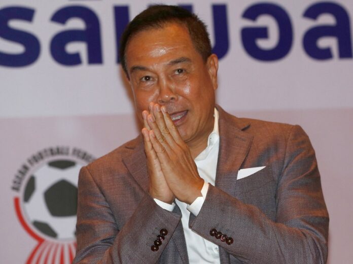 Football Association of Thailand President Somyot Poompanmuang gives a wai after a press conference in November in Bangkok. Photo: Sakchai Lalit / Associated Press