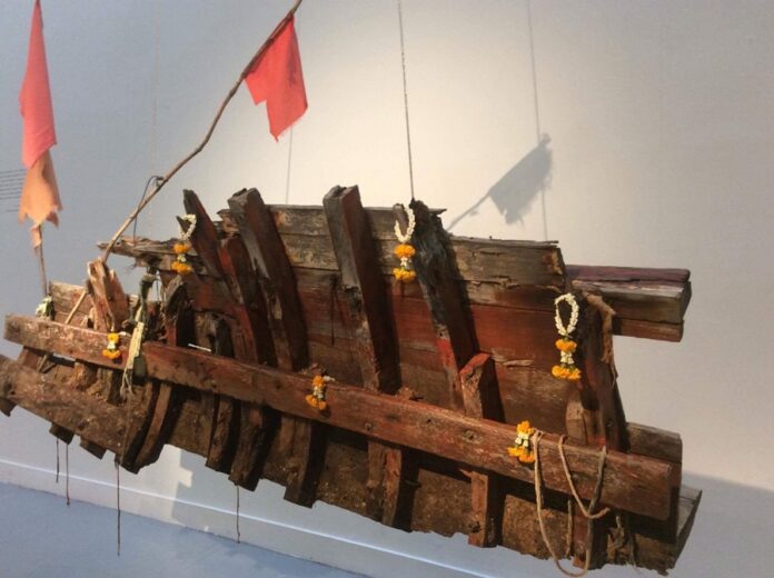 Part of a boat salvaged from Koh Lanta and on display at the BACC on Saturday