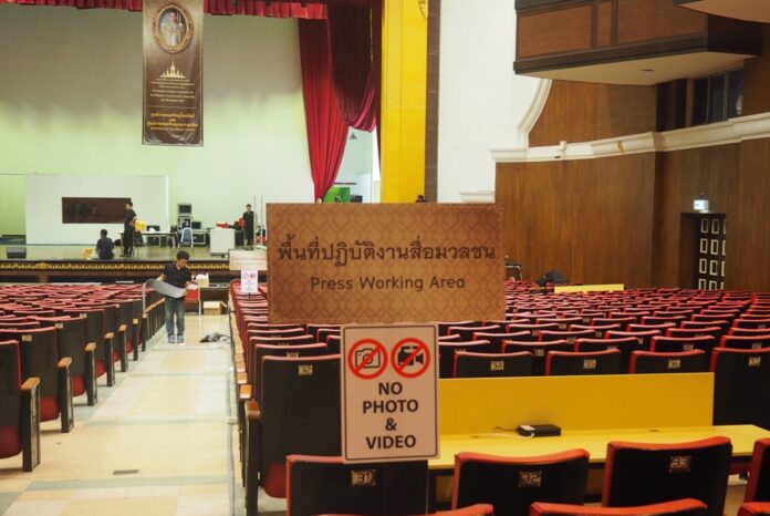 Officials on Oct. 2 prepare a press working area at Thammasat University for reporters covering the royal cremation.