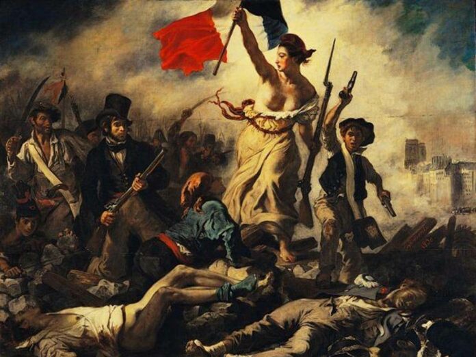 A woman personifying the Goddess of Liberty leads the people forward holding the revolutionary flag that became today's French flag in 'Liberty Leading the People.' Eugène Delacroix, 1830.
