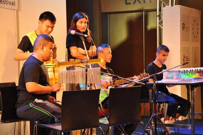 Blind students from Thammik Witthaya School perform 'Blossom on the Moon.'