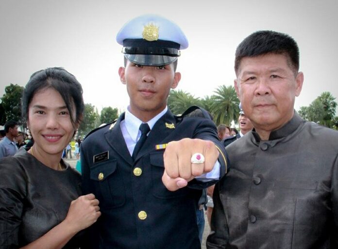 Pakapong Tanyakan Pakapong Tanyakan poses in a photo on Aug. 16 with his parents at the Armed Forces Academies Preparatory School in Nakhon Nayok province. Image: Sukanya Tanyakan / Facebook