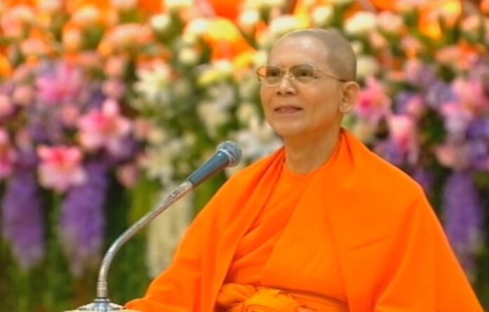 Dhammajayo speaks to his followers in a June 2, 2014 video. Image: DMC Channel / YouTube