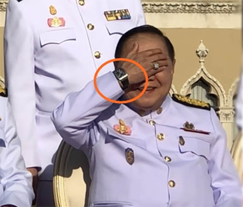 Gen. Prawit Wongsuwan flashes a watch thought to cost several million baht in a Monday photo.