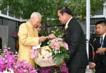 ‘Stick to Your Goals’ to Win Support, King’s Adviser Urges Prem Tinsulanonda, chairman of the king's Privy Council at left, receives a gift basket from junta leader Prayuth Chan-ocha, who serves as prime minister.