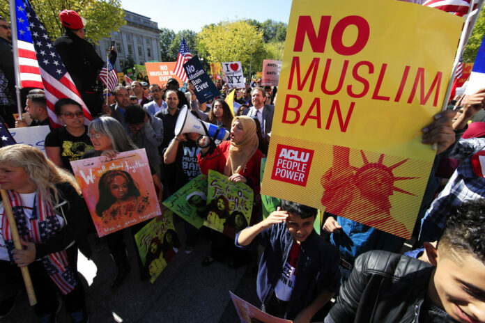 Protesters gather Oct. 18, 2017, at a rally in Washington. Photo: Manuel Balce Ceneta / Associated Press
