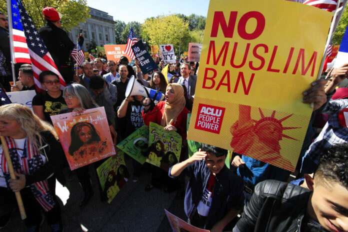 Trump Travel Ban Protesters gather Oct. 18, 2017, at a rally in Washington. Photo: Manuel Balce Ceneta / Associated Press