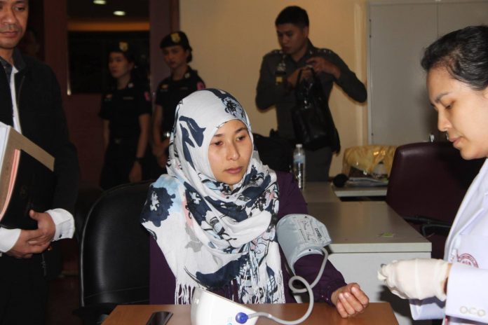 Wanna Suansan undergoes medical examination on Nov. 22 shortly after she was arrested in Bangkok