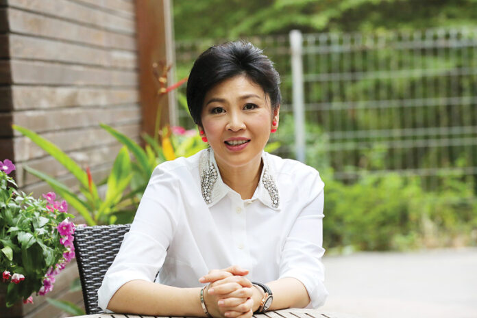 Former prime minister Yingluck Shinawatra poses for a photo on Jan. 2, 2016