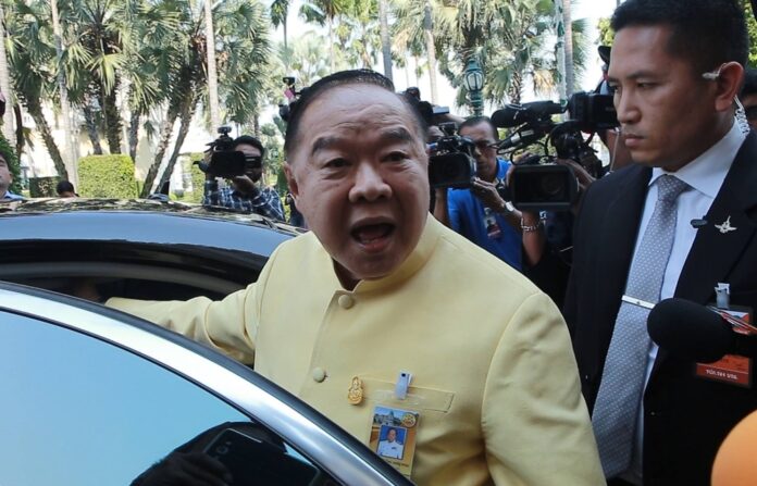 Deputy junta chairman Prawit Wongsuwan shouts to reporters 16 Jan.