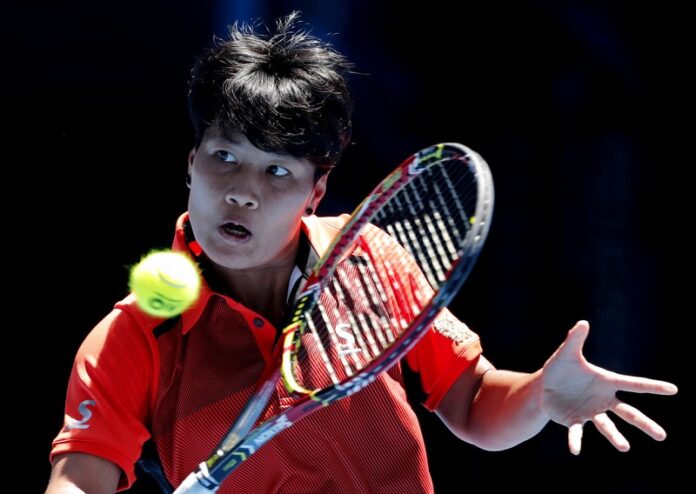 Thailand's Luksika Kumkhum plays a return shot to Switzerland's Belinda Bencic during their second round match at the Australian Open tennis championships in January in Melbourne, Australia. Photo: Vincent Thian / Associated Press