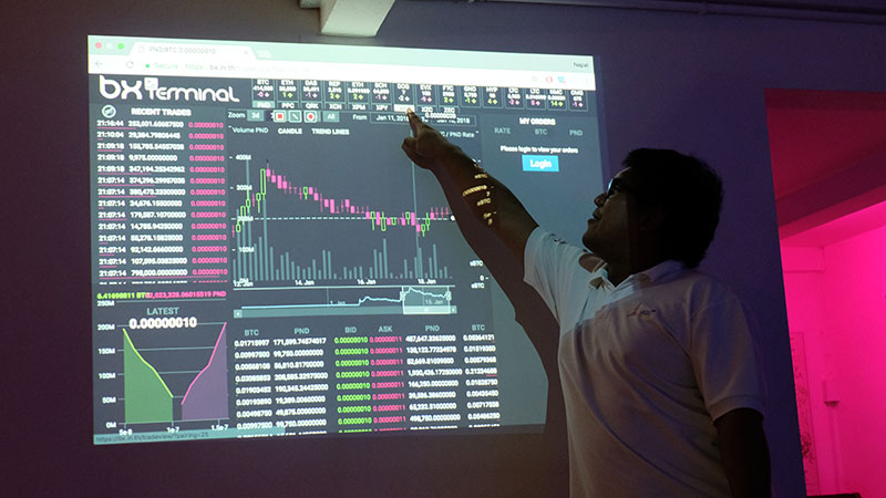 One customer pulls up Bitcoin data at Bad Taste Cafe.