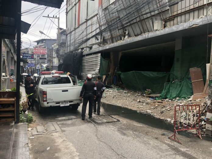 Police outside the Boutique Pattaya Hotel on Thursday.