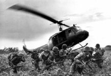 Remains of US Air Crew Lost Over Laos in Vietnam War Identified In this June 1970 file photo, taken by Associated Press photographer Huynh Cong "Nick" Ut, south Vietnamese Marines rush to the point where descending U.S. Army helicopter will pick them up after a sweep east of the Cambodian town of Prey-Veng during the Vietnam War. It only took a second for Associated Press Photographer Huynh Cong "Nick" Ut to snap the iconic black-and-white image of Phan Thi Kim Phuc after a napalm attack in 1972, but it communicated the horrors of the Vietnam War in a way words could never describe. Nick Ut / Associated Press