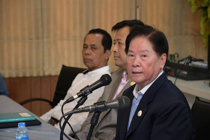 Samphan Lertnuwat (right), de facto leader of the new Citizen Power Party seen here Tuesday in his Bangkok residence.