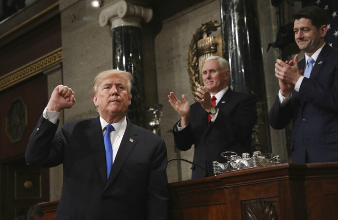 State of Union President Donald Trump gestures as he finishes his first State of the Union address in the House chamber of the U.S. Capitol to a joint session of Congress on Tuesday. Photo: Win McNamee / Associated Press