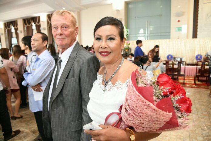A couple registers their marriage Wednesday at Bang Rak District Office.