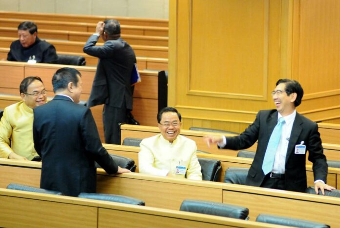 National Legislative Assembly members chat with each other on Jan. 25.
