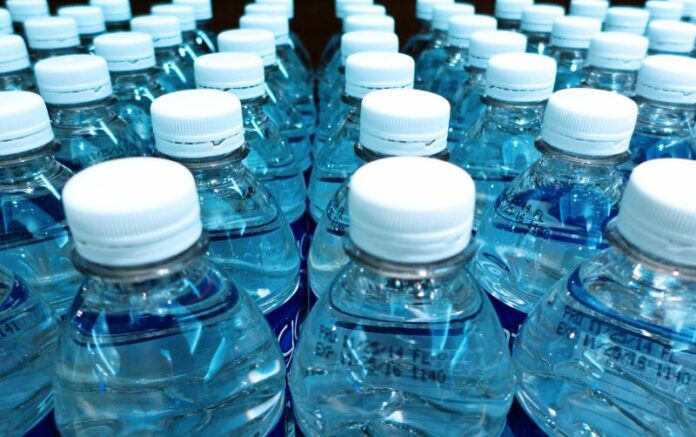 Water bottles without cap seals. Photo: Thad Zajdowicz / Flickr