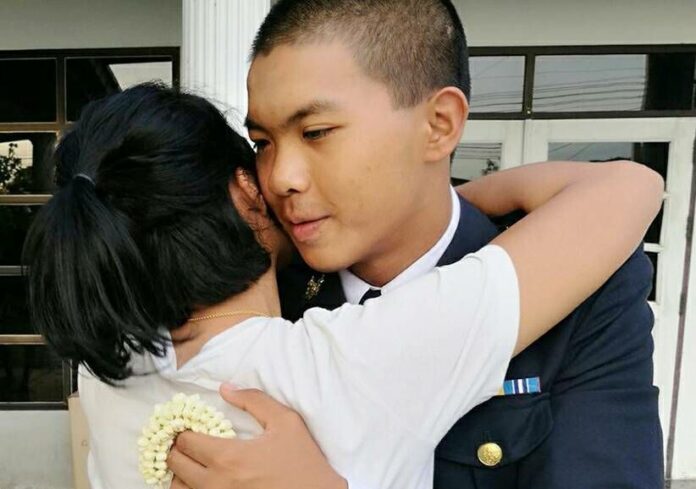 Cadet Pakapong Tanyakan embraces his mother in a photo posted online Jan. 1. Image: Sukanya Tanyakan / Facebook