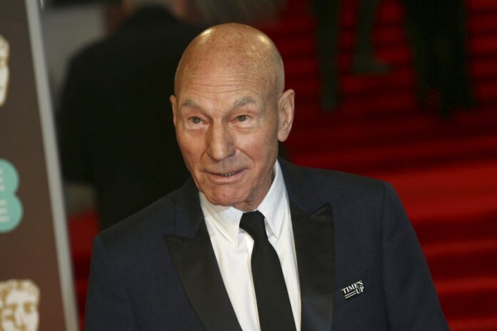 Actor Sir Patrick Stewart poses for photographers upon arrival at the BAFTA 2018 Awards on Sunday in London. Photo: Joel C Ryan / Associated Press