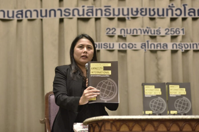 Piyanut Kotsan, director of Amnesty Thailand, at a launch event for Amnesty International’s 2017 report. Photo: Amnesty Thailand