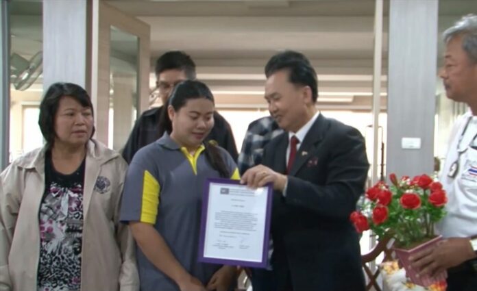University student Panida Yospanya, 22, receives an award Feb. 13 from an anti-corruption organization for speaking out about a fraud scheme in Khon Kaen province.