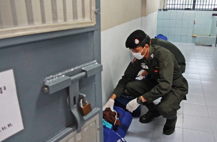 Police search a prison cell in Chumphon province on April 27 to search for contraband