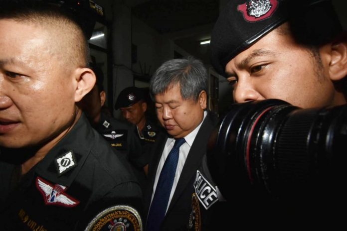 Italian-Thai Development president Premchai Karnasuta meets with police Wednesday