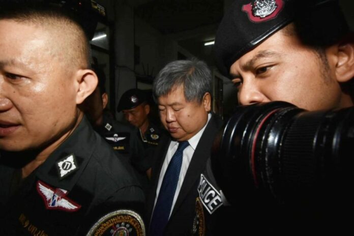 Italian-Thai Development president Premchai Karnasuta meets with police Wednesday