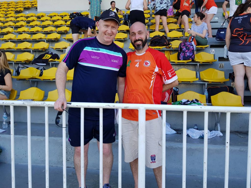Joe Trolan, right, and Ronon O Coisdealbha, head of sports for Irish television channel TG4, March 17 at the Chulalongkorn University Stadium.