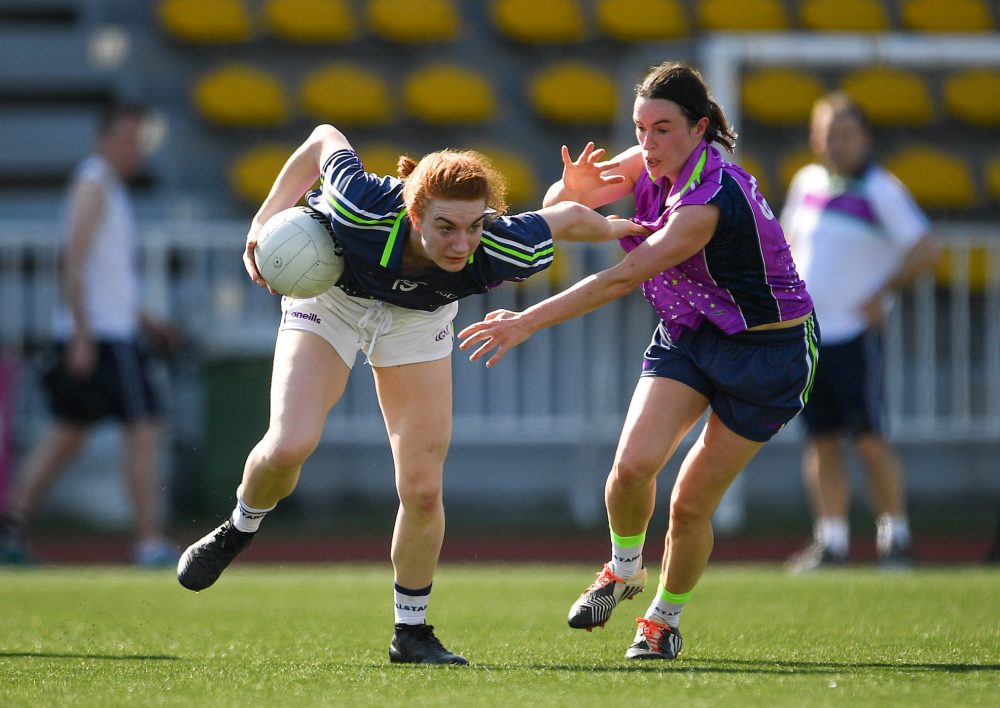 Top: Lauren Magee, left, Dublin and the 2017 team, in action against Sinead Aherne, Dublin and the 2016 team, during the exhibition match March 17 at the Chulalongkorn University Stadium. Photo: Ladies Gaelic Football / Facebook