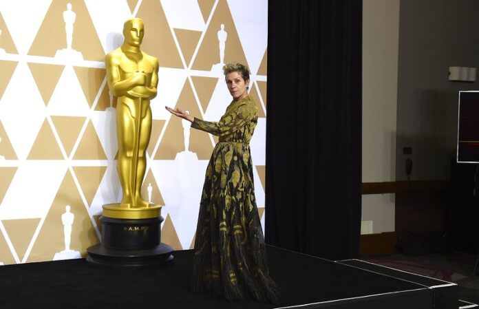 Frances McDormand poses in the press room at the Oscars on Sunday, March 4, 2018, at the Dolby Theatre in Los Angeles. Photo: Jordan Strauss / Associated Press