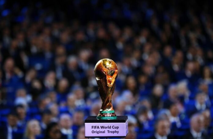 The World Cup trophy is placed on display during the 2018 soccer World Cup draw last year in the Kremlin in Moscow. Photo: Alexander Zemlianichenko / Associated Press