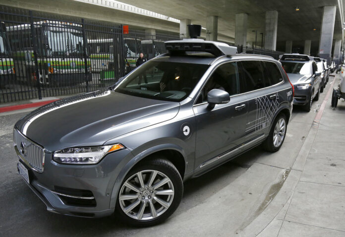 An Uber driverless car heads out for a test drive in 2016 in San Francisco. Photo: Eric Risberg / Associated Press