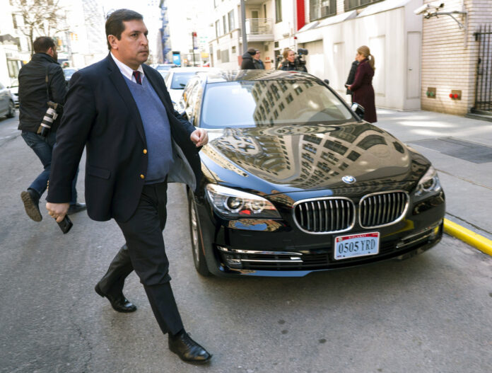 Russian Deputy Permanent Representative Vladimir Safronkov arrives at the Permanent Mission of the Russian Federation Monday in New York. Photo: Craig Ruttle / Associated Press