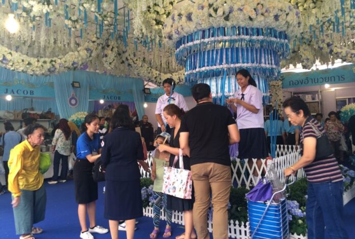 Visitors participate in a prize draw at 2016 Red Cross Fair