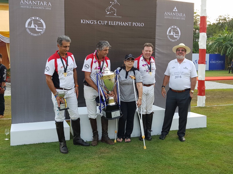 William Heinecke (right) stands next to team Mekong on Sunday as they celebrate their victory.