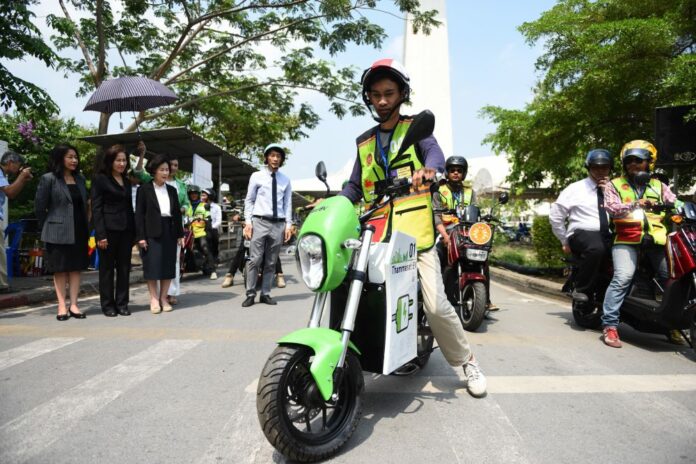Motorcycle drivers on Thursday morning ride Sola Ryde at Thammasat University, Rangsit campus.